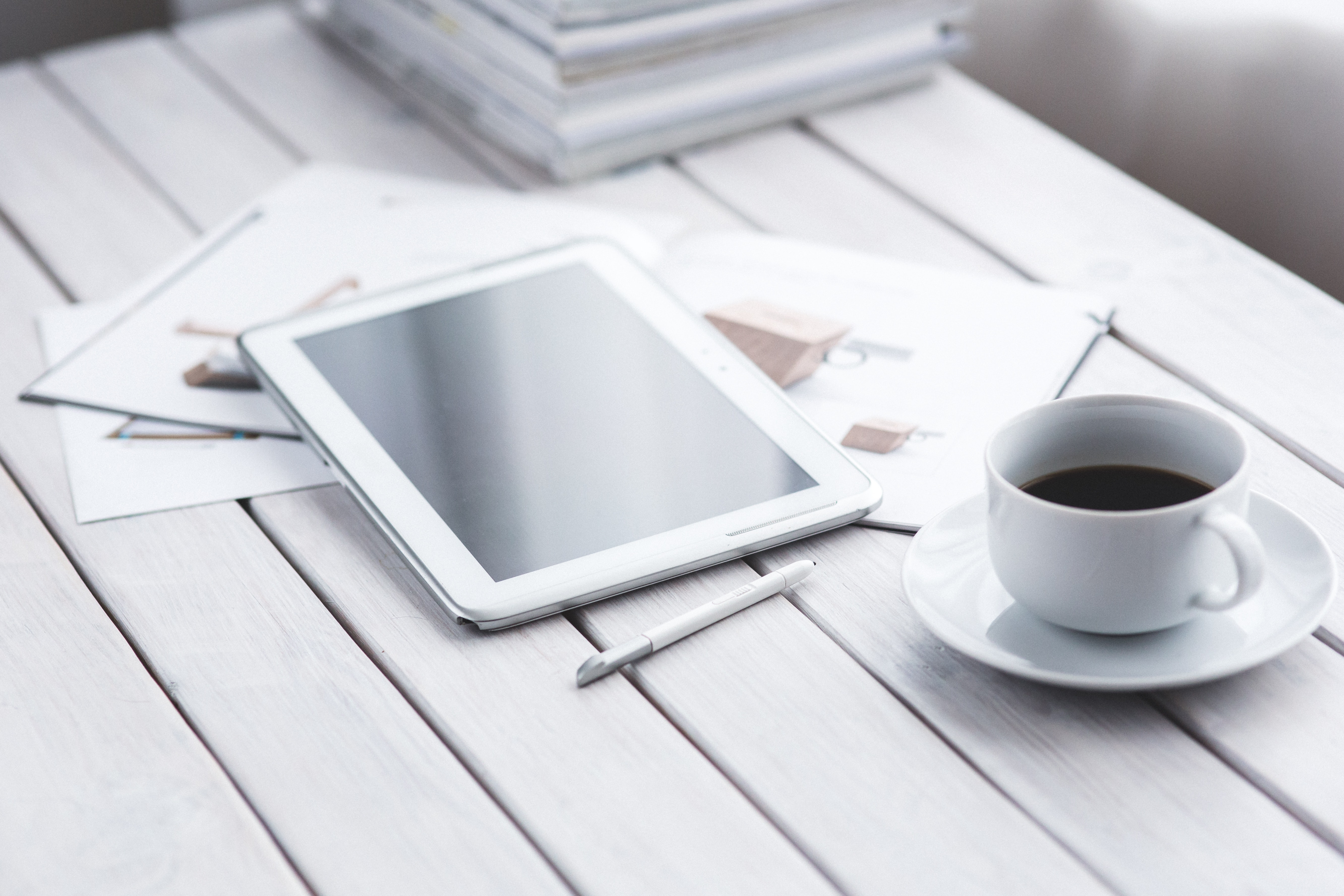 Tablet and Coffee on Table